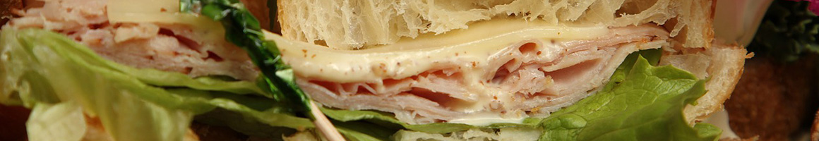 Eating Italian Sandwich at Bella Donna Subs restaurant in Austin, TX.